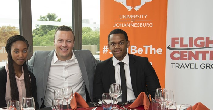 Trishia Tshandu and Neo Malema with Andrew Stark of Flight Centre