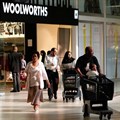 Shoppers leave a Woolworths store in Lenasia, south of Johannesburg. Picture: