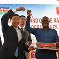 - Kenyan Minister for Transport and Infrastructure James Macharia (C) and the Managing Director of the Kenya Railways Corporation Atanas Maina (R, front) attend the reception ceremony of the first batch of locomotives for the Mombasa-Nairobi standard gauge railway in Mombasa. Photo: Sun Ruibo/Xinhua