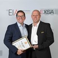 Nick Sarnadas, event director of Food and Hospitality Africa, and Gary Corin, managing director of Specialised Montgomery Exhibitions, accept the award.