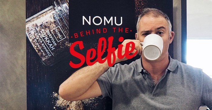 Raphaely assisting in the most important job at the office – taste testing!