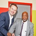 Thomas Schaefer, chairman and MD of VW Group SA and Themba Kojana, head of department for the Eastern Cape Dept of Education.