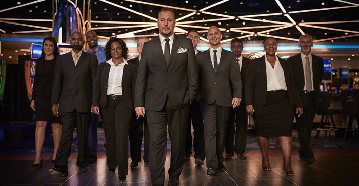 Time Square team: In front, Brett Hoppé (General Manager: Time Square). Second row (left to right): Mohamed Cassim (IT Manager: Time Square); Emma Mothibi (VIP Operations Manager: Time Square); Elroy van Blerk (Operations Manager: Time Square); Faniswa Mkosana (Human Resources Manager: Time Square) and Kevin Caswell (Tables Manager: Time Square).<p>Back row from (left to right): Anneli Petrowski (Personal Assistant); Sandise Sibanda (Marketing Manager: Time Square); Shaun Rennie (Group Surveillance and Security Manager: Sun International); Bianco Marini (Slots Manager: Time Square) and Ruben Nadesan, (Financial Operations Manager: Time Square).