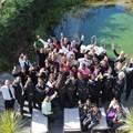 Hotel Verde staff celebrating the good news of FTT accreditation at the eco pool