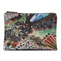 Qantas curates top Australian artwork for its business class amenity kits