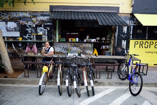 In Maboneng, bikes and bistros abound. In adjacent inner-city Johannesburg, people struggle to survive. South African Tourism/Flickr