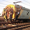 Commuters climbing on a Khayelitsha-bound train. Photo by Mandla Mnyakama