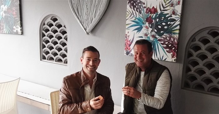 Kaiser interviewing mentalist Gilan Gork.