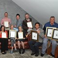 Platinum and Gold winners group. Front L to R: Ian Sieg (GWK Landzicht), Crystal Loggerenberg (GWK Landzicht), Mathilda Viljoen (Du Toitskloof), Marli Brink (Boplaas), Alvi van der Merwe (Alvi’s Drift), Chris Venter (Orange River Cellars). Back L to R: Henri Swiegers (Muskadel SA), André Scriven (Rooiberg), Tiaan Loubser (Du Toitskloof) and Paul Burger (Nuy).