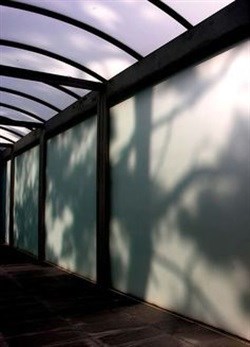 Allowing the sun to project wind-animated shadows onto the exterior of translucent materials, such as obscured glass, can also effectively bring that movement indoors. (Click to zoom.) Kevin Nute, CC BY-NC-ND