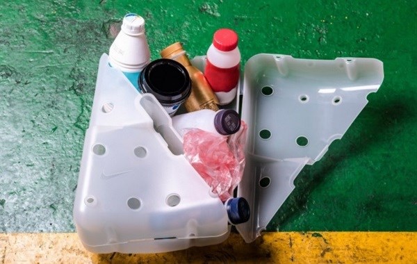 Nike designs shoebox made out of recycled milk containers and coffee lids