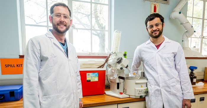 PhD chemistry students Anton Hamann (left) and Jonathan Hay with the ‘Closed-Cold-Water-Recycling-System’ they developed for their laboratory in the De Beers Building at Stellenbosch University. Photo: Stefan Els