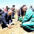 Minister Senzeni Zokwana, MEC Oupa Khoabane planting a food garden during household visits in Phuthaditjhaba