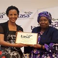 TASA President, Mary Phadi handing Dr Nkosazana Dlamini-Zuma a token of appreciation after her keynote speech.
