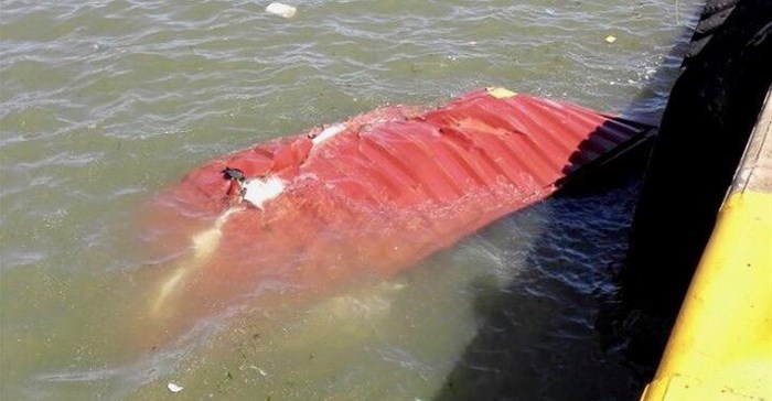 A shipping container lies submerged in Durban harbour after the October 10 storm: Photo: Salt Fishing South Africa