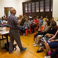Shaheed Mahomed of Workers’ World addresses a coalition meeting to discuss the City’s plans for the drought. Photo: Ashraf Hendricks