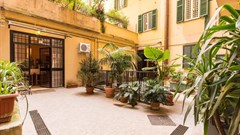 Colosseum Vacation Home in Rome, Italy - Level access is via a pretty courtyard which leads into the spacious, newly modernised home, with one bedroom and bathroom that have been specifically converted for guests with a disability or mobility issue. Source: