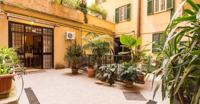 Colosseum Vacation Home in Rome, Italy - Level access is via a pretty courtyard which leads into the spacious, newly modernised home, with one bedroom and bathroom that have been specifically converted for guests with a disability or mobility issue. Source: