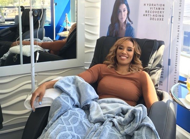 Leigh-Anne Williams from Expresso receiving one of the IV drips. © African Star Communications.