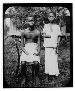 Atrocities: two youths in the Belgian Congo with severed hands. , Author provided