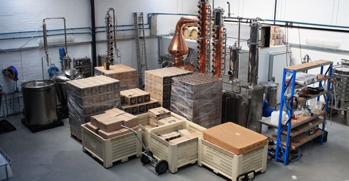 The tasting room overlooks the distillery. (Image Supplied)