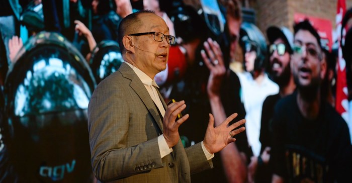 Dion Chang speaking at the 2018 Trialogue Business in Society Conference