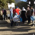 People queueing for drinking water at the Newlands spring, Cape Town. (Photo: Ralph Tyrrell)