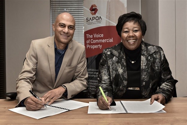 SAPOA CEO Neil Gopal and PSCC CEO Portia Tau-Sekati sign MoU in Johannesburg