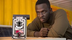 Brian Gitta with his Mattibabu malaria testing device