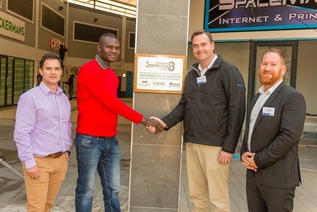L-R: Jurgens Prinsloo, MD of Abland; Councillor Enos Chiloane; Andrew Honeyborne, development manager, Abland; and Adam Marcus, Fairvest partner