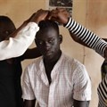 An actor and film crew prepare before a rehearsal in the office of Junub Open Space, a grassroots group that promotes social change in Juba, South Sudan. Credit: Thomson Reuters Foundation/ShanShan Chen.