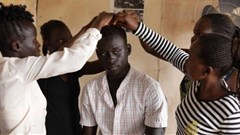 An actor and film crew prepare before a rehearsal in the office of Junub Open Space, a grassroots group that promotes social change in Juba, South Sudan. Credit: Thomson Reuters Foundation/ShanShan Chen.
