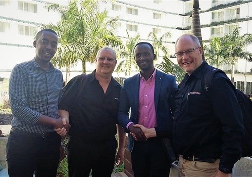 New business partners in Kigali, Rwanda. From left to right: Christian Gakwaya. Rwanda Events: CEO; Alastair Stead, Scan Display: African Business Development Manager; Gihana Olivier, Rwanda Events’ lawyer; Justin Hawes, Scan Display: Managing Director.