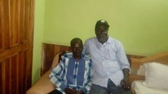Nigerian journalist Jones Abiri (left) and Alagoa Morris (right) in Abuja after Abiri's release from detention on August 15, 2018.
