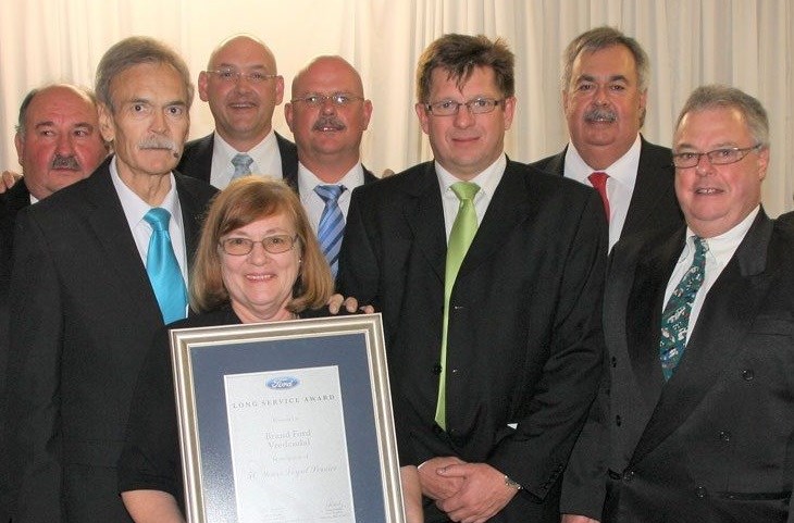 Yvonne Brand receiving a Long Service Award.