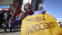 A supporter of Uhuru Kenyatta after the Kenyan president’s ICC charges were dropped in December, 2014. Daniel Irungu/EPA