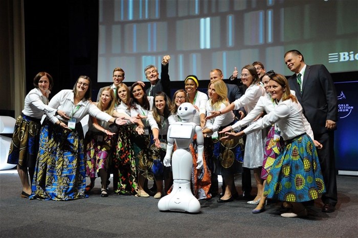 Members of the organising committee of the Biomin World Nutrition Forum 2018 with “Miss Pepper”, the humanoid robot.