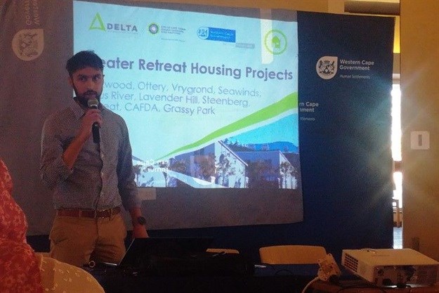 Abdul Dhansey of Delta Built Environment Consultants briefed residents on progress with the Greater Retreat Housing Projects. Photo: Barbara Maregele