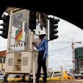 A traffic policewoman pictured in Yaoundé in October 2018. A journalist was attacked outside his home in the city on January 31. Credit: CPJ/Reuters/Zohra Bensemra.