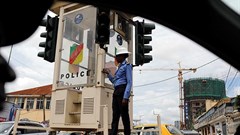 A traffic policewoman pictured in Yaoundé in October 2018. A journalist was attacked outside his home in the city on January 31. Credit: CPJ/Reuters/Zohra Bensemra.