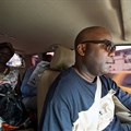 FrontPageAfrica publisher Rodney Sieh, pictured on his release from prison in November 2013. Sieh says journalists in Liberia continue to face threats and harassment for their critical reporting. (CPJ/AP/Mark Darrough).