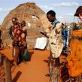 An aid worker collects health and nutrition data in northeastern Kenya. Shutterstock