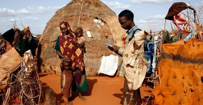 An aid worker collects health and nutrition data in northeastern Kenya. Shutterstock