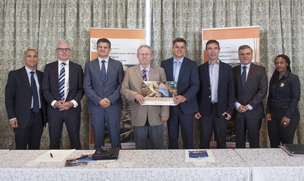 Minister Rob Davies, and chairperson of Industry Association for Alcohol Responsibility and Education, Rico Basson, with representatives of Distell, Heineken, Diageo, Pernod Ricard, SALBA and Vinpro.