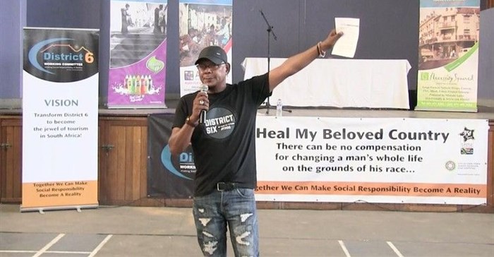 Shahied Ajam, the chairperson of the District Six Working Committee, addressed dozens of claimants to land in the neighbourhood. Photo: Shamiel Benjamin