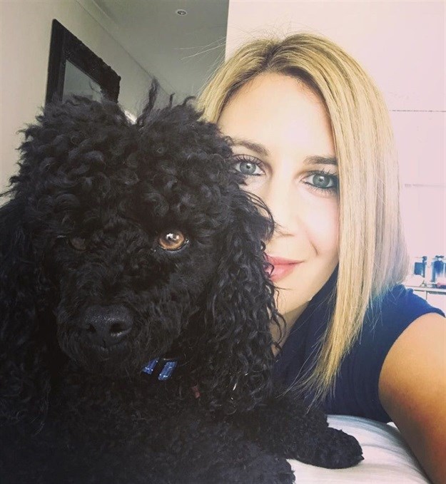 Keyes chilling on a Sunday with her poodle, Frankie London.