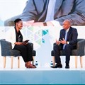 Zipho Sikhakhane, global speaker, entrepreneur and business strategist interviewing mayor Herman Mashaba, founder of Black Like Me.