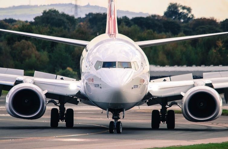 A Boeing 737 taxies at Manchester Airport in the United Kingdom.