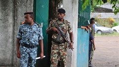 Soldiers stand guard on April 2, 2019, in Moroni, the capital of the Comoros. Journalists have been detained and newspapers have been disrupted surrounding the country's recent presidential election. Credit: CPJ/AFP/Youssouf Ibrahim.