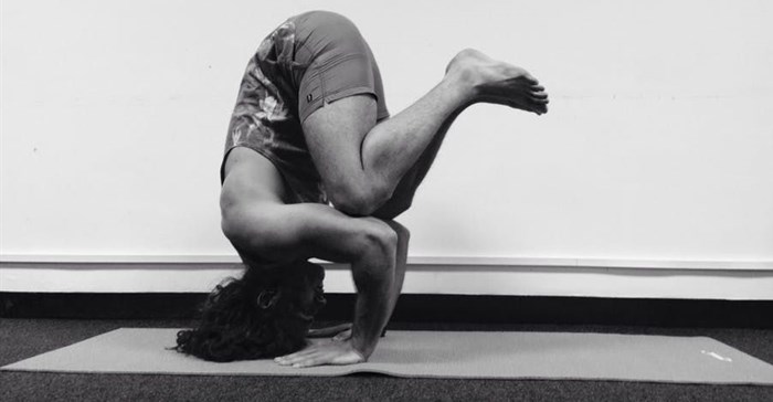 A University of Cape Town medical student doing yoga for a project that draws on ideas from medical and health humanities. Third Year Yoga SSM